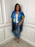Blue and yellow starry print kimono with relaxed styling over white blouse and jeans for modern womens fashion everyday wear. - Starry Night Kimono