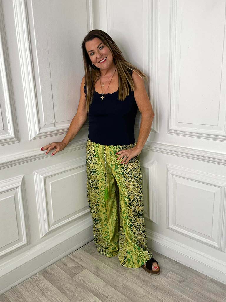 Yellow and green silk boho palazzo trousers styled with a black tank top for relaxed womens fashion everyday wear. - Silk Boho Palazzos - Yellow & Green