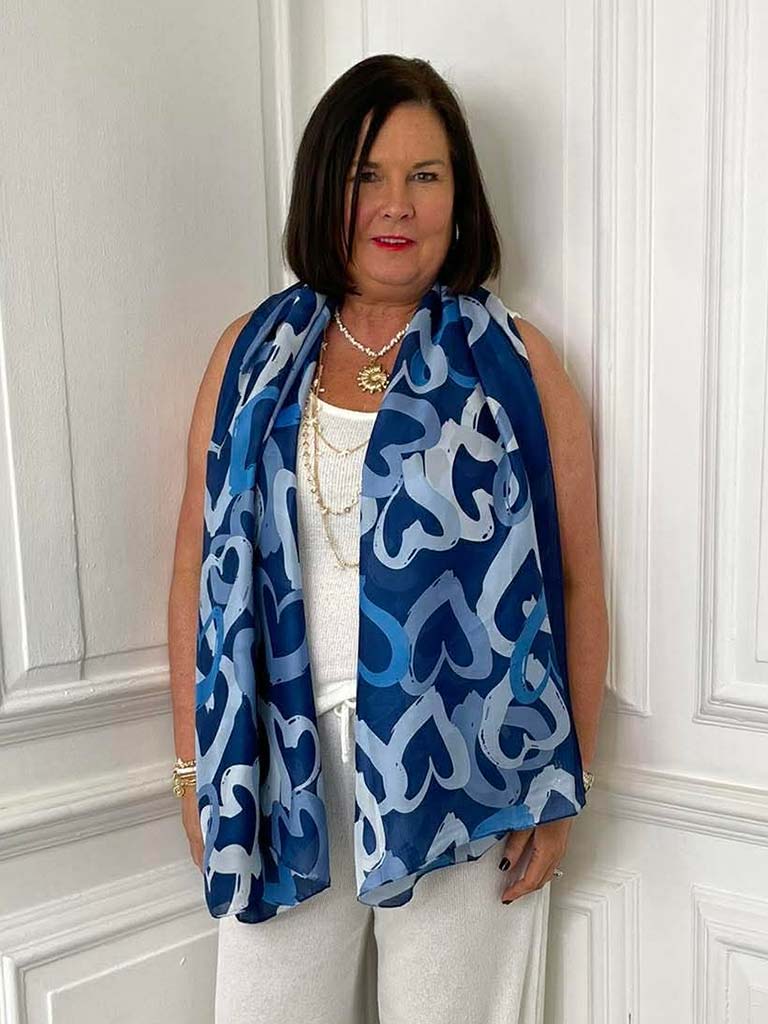 Blue Malissa J Heart Scarf with white heart patterns, styled for womens fashion and relaxed everyday wear. - Malissa J Heart Scarf - Blue