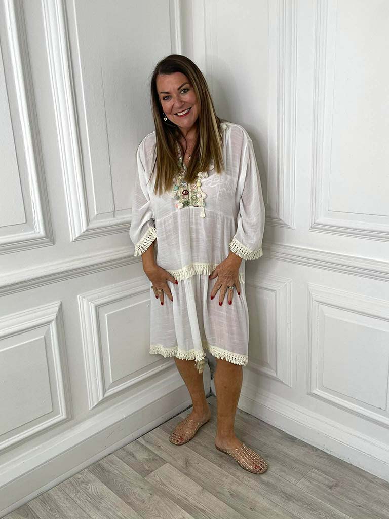 White pastel pom pom kaftan dress with relaxed styling and floral embroidery, perfect for everyday womens fashion and modern . - Pastel Pom Pom Kaftan Dress