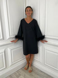 Black feather-trimmed dress with V-neck and loose sleeves, relaxed styling for modern womens fashion and everyday wear. - Malissa J Rio Feather Dress - Black
