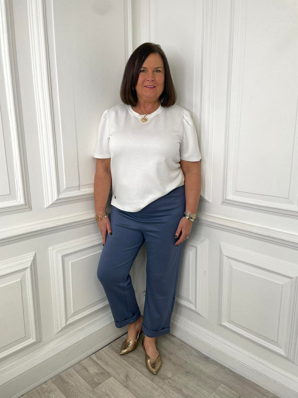 Blue denim cuffed cigarette trousers paired with white puff-sleeve top for relaxed womens fashion everyday wear. - Malissa J Jersey Cuffed Cigarette Trousers - Denim