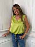 Lime silk-feel drawstring vest with relaxed styling paired with casual jeans for modern womens fashion everyday wear. - Malissa J Silk Feel Drawstring Vest - Lime