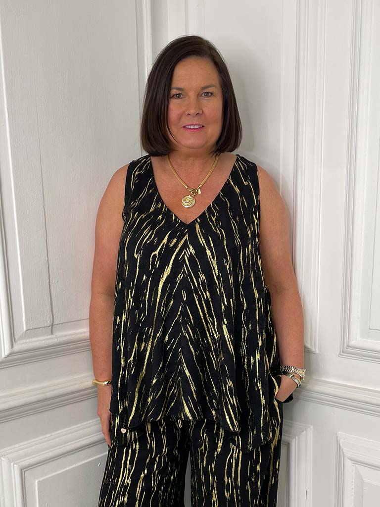 Black and gold V-neck bias cut vest with abstract stripe pattern, relaxed styling for everyday wear, modern womens fashion. - Malissa J V-Neck Bias Cut Vest - Black & Gold