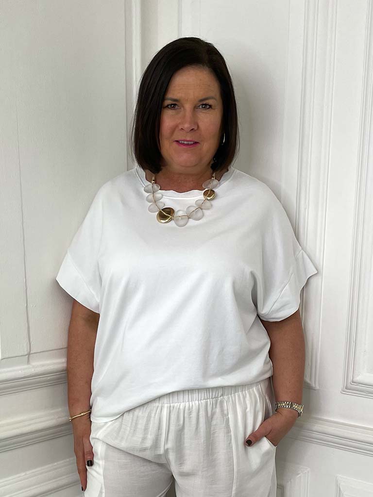 White cotton blend tee with relaxed fit, short sleeves, styled for modern womens fashion and everyday wear. - Cotton Blend Tee