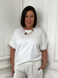White cotton blend tee with relaxed fit, short sleeves, styled for modern womens fashion and everyday wear. - Cotton Blend Tee