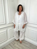 White relaxed tie-front throwover in lightweight fabric styled for womens fashion and everyday wear. - Relaxed Tie Throwover