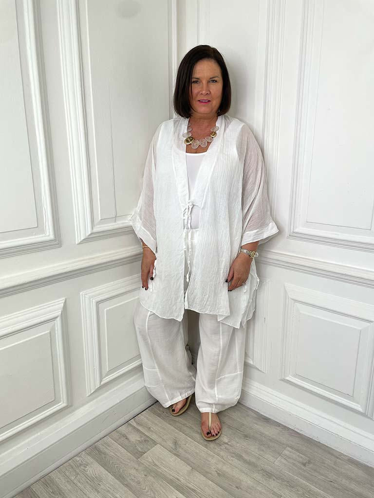 White relaxed tie-front throwover in lightweight fabric styled for womens fashion and everyday wear. - Relaxed Tie Throwover