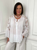 White crochet lace boho blouse with pintuck details and relaxed fit for womens fashion everyday wear. - Garden Lace Boho Blouse