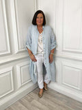 Sky-blue striped linen shirt dress with relaxed fit, styled over white casual outfit for modern everyday womens fashion. - Stripe Linen Shirt Dress - Sky