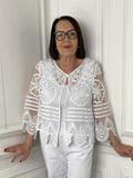 White boho lace crochet jacket with floral patterns, relaxed styling for womens fashion everyday wear. - Boho Lace Crochet Jacket - White