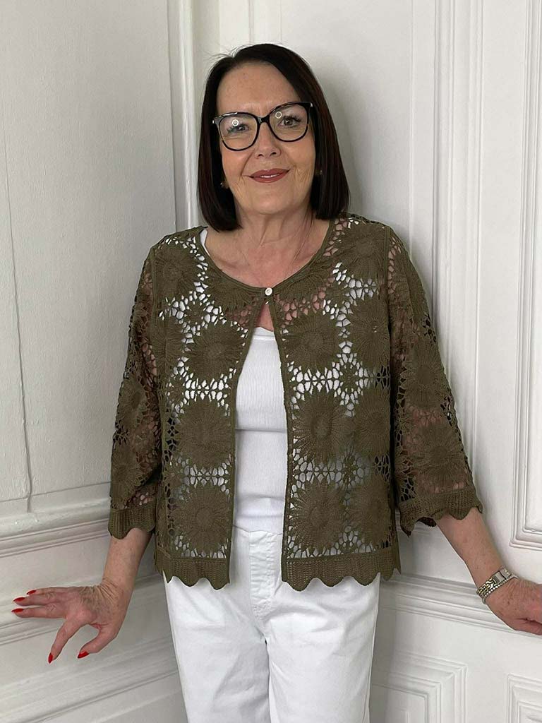 Khaki daisy crochet jacket with scalloped edges, layered over white top and trousers for relaxed styling in womens fashion. - Daisy Crochet Jacket - Khaki