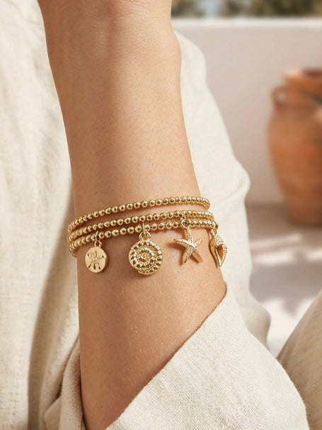 Envy Triple Strand Shell Charm Bracelet - Gold